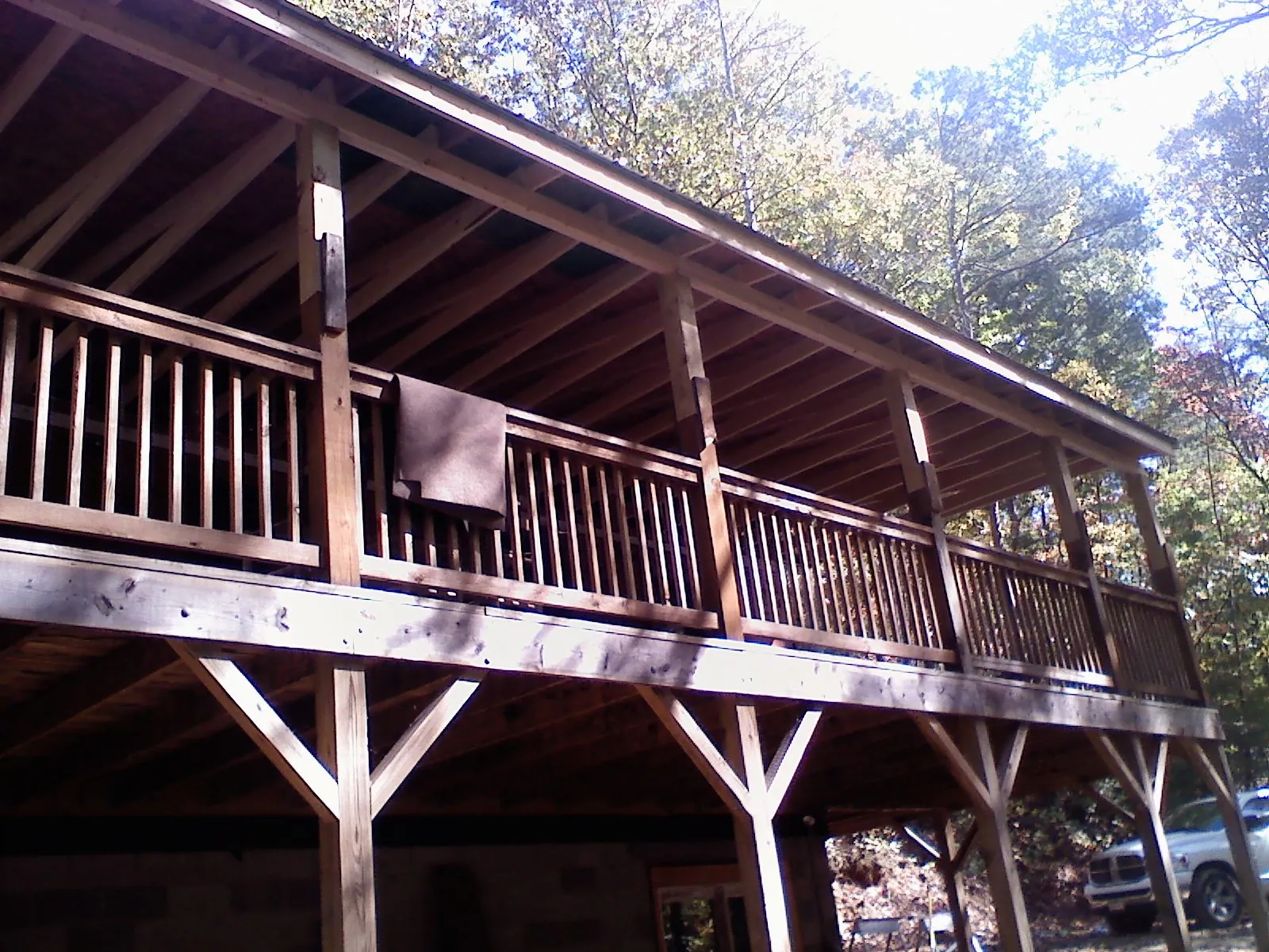 Timber framing under a new elevated porch and deck — Roof Leak Repair in Jacobsburg by Roofing Brothers